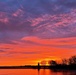 Purple and orange sunrise at Cheboygan River Crib Light