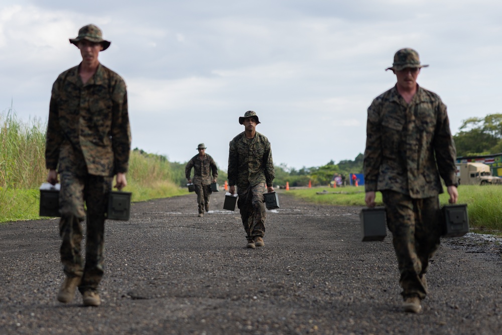 U.S. Marines with Littoral Craft Company Charlie participate in an exercise gauntlet during the Colombian Fluvial Operations Course