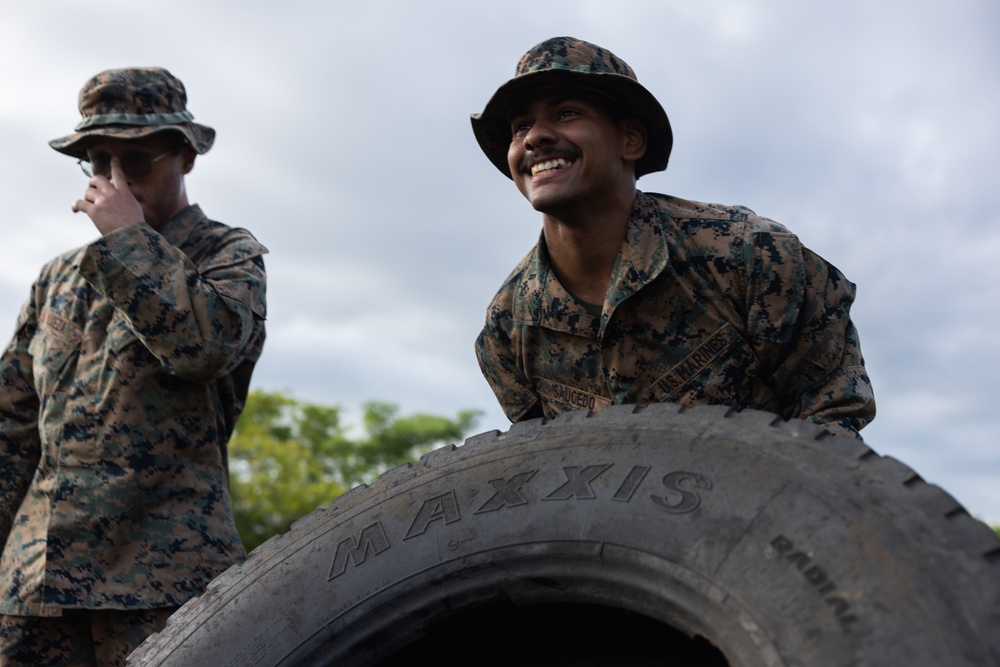 U.S. Marines with Littoral Craft Company Charlie participate in an exercise gauntlet during the Colombian Fluvial Operations Course