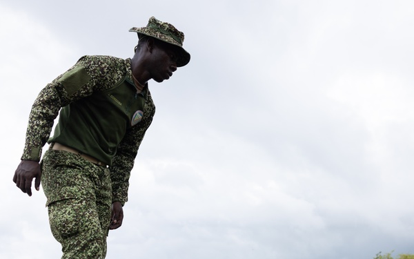 U.S. Marines with Littoral Craft Company Charlie participate in an exercise gauntlet during the Colombian Fluvial Operations Course
