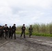 U.S. Marines with Littoral Craft Company Charlie participate in an exercise gauntlet during the Colombian Fluvial Operations Course