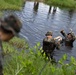 U.S. Marines with Littoral Craft Company Charlie participate in an exercise gauntlet during the Colombian Fluvial Operations Course