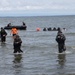 U.S. Marines with Littoral Craft Company Charlie participate in an exercise gauntlet during the Colombian Fluvial Operations Course