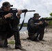 U.S. Marines with Littoral Craft Company Charlie participate in an exercise gauntlet during the Colombian Fluvial Operations Course