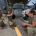 Installation of safety cables on the turret of the HC-130J Combat King II aircraft