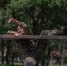 1st Lt. Brianna Mirmina negotiates an obstacle