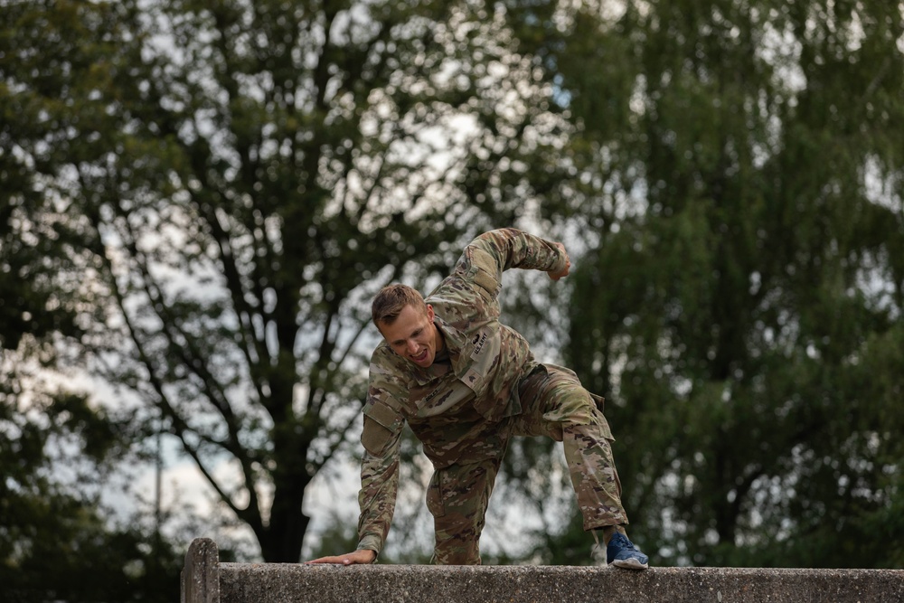 Sgt. Thomas Doles negotiates an obstacle