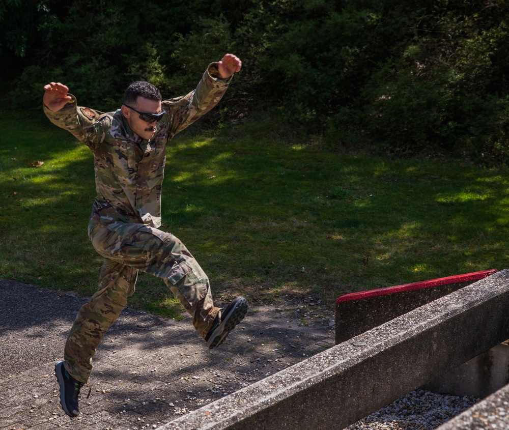 Lieutenant Colonel Thomas D. Sebastiani bounds upon a platform