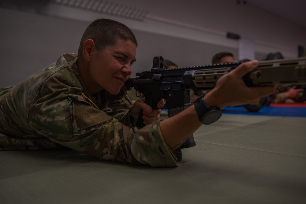 First Lieutenant Susan A. Janfrancisco aims down her sights