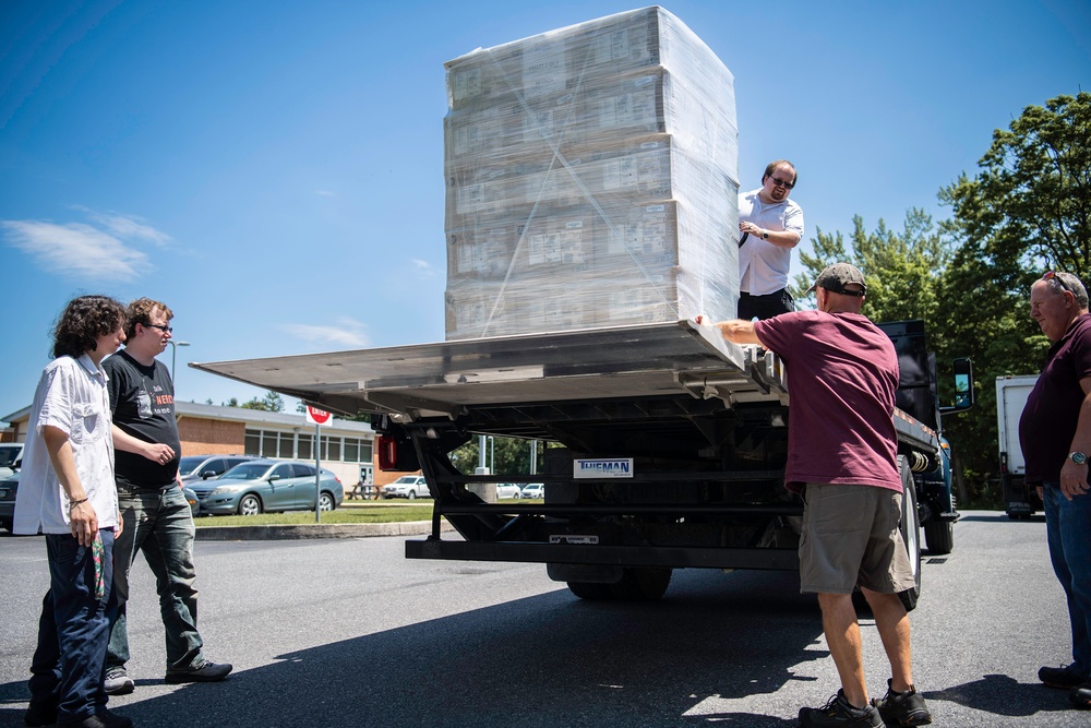 Army depot supplies computers to local school districts