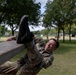 Sgt. 1st Class Benjamin Latham tries to get over an obstacle