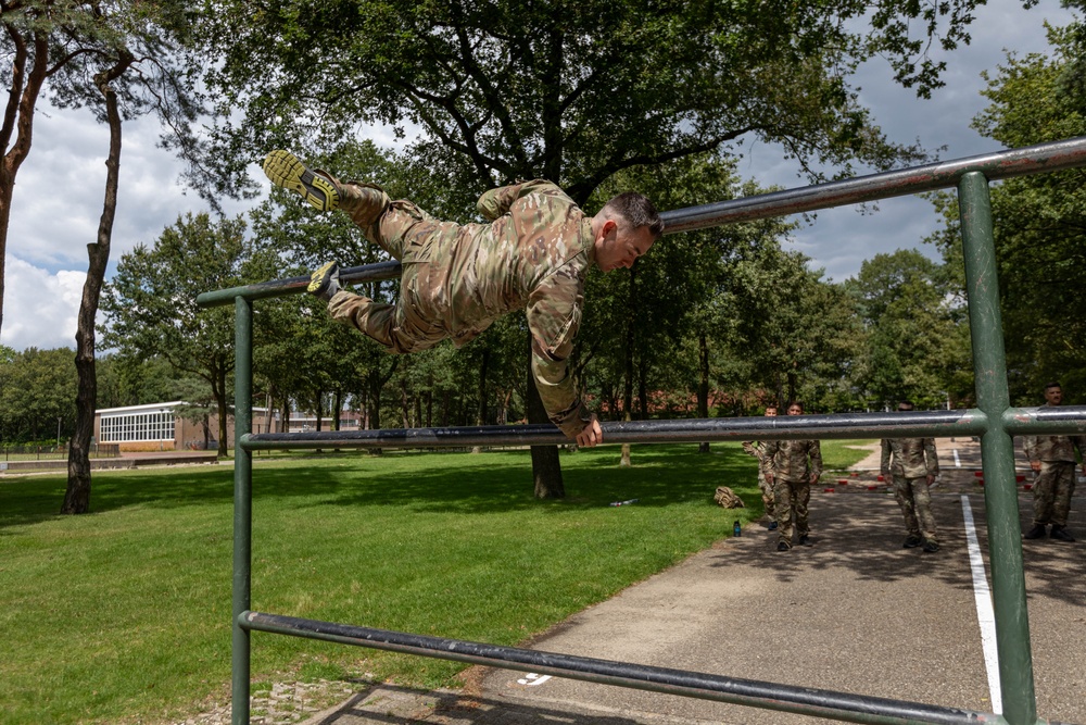 1st Lt.  Michael Vigh hurdles