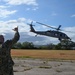 VADM Wade waves at MH-60S Sea Hawk Helicopter during RIMPAC 2024