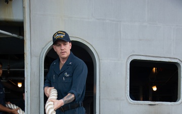 Nimitz Sailor Removes Line From Bit
