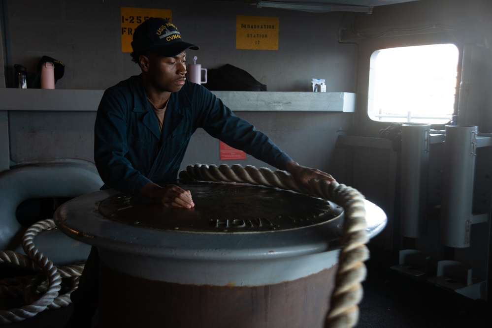 Nimitz Sailor Heaves Around Line
