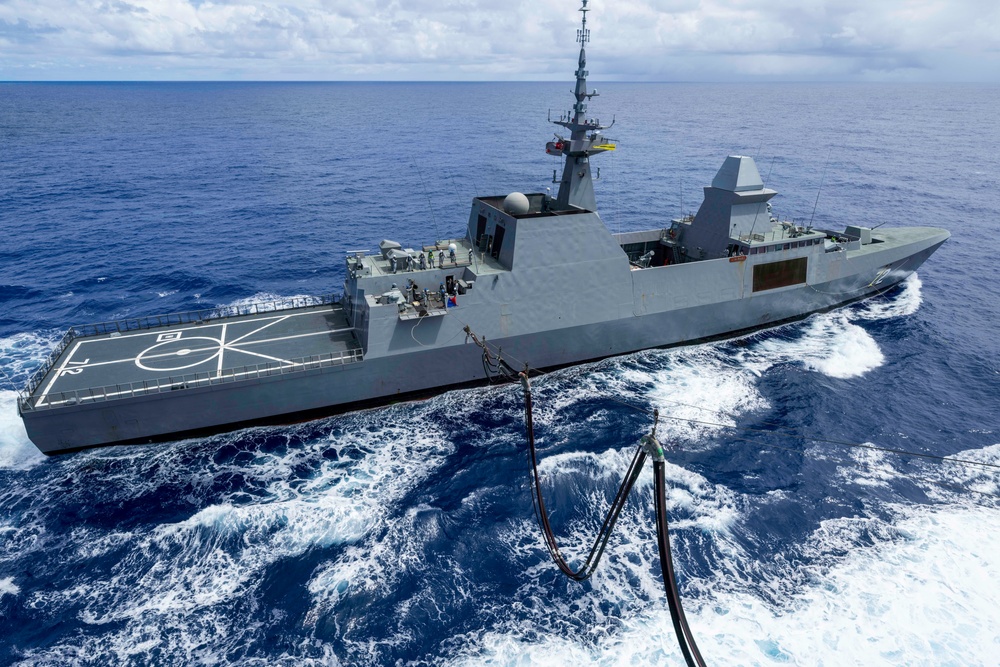 Replenishment at sea with MV Asterix, RSS Stalwart