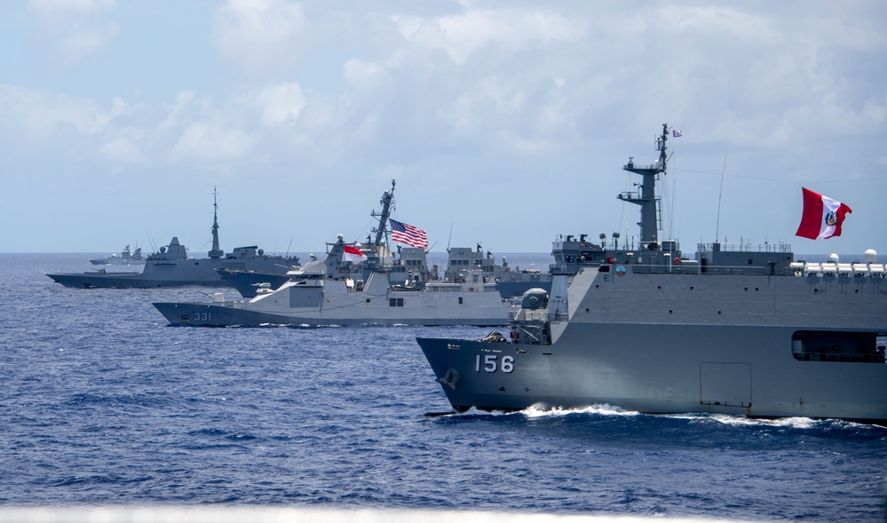 Multinational ships sail in formation during RIMPAC 2024