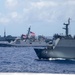 Multinational ships sail in formation during RIMPAC 2024
