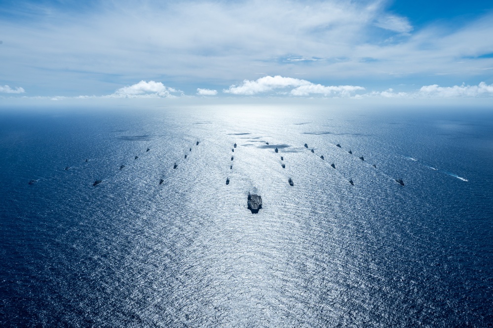 Multinational ships sail in formation during RIMPAC 2024