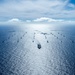 Multinational ships sail in formation during RIMPAC 2024