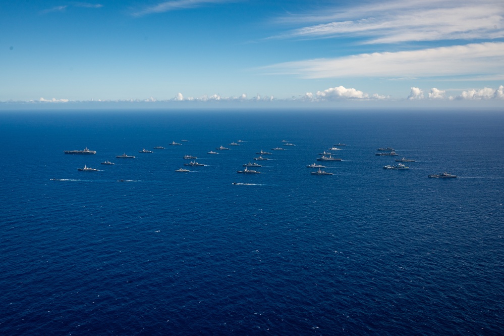 Multinational ships sail in formation during RIMPAC 2024