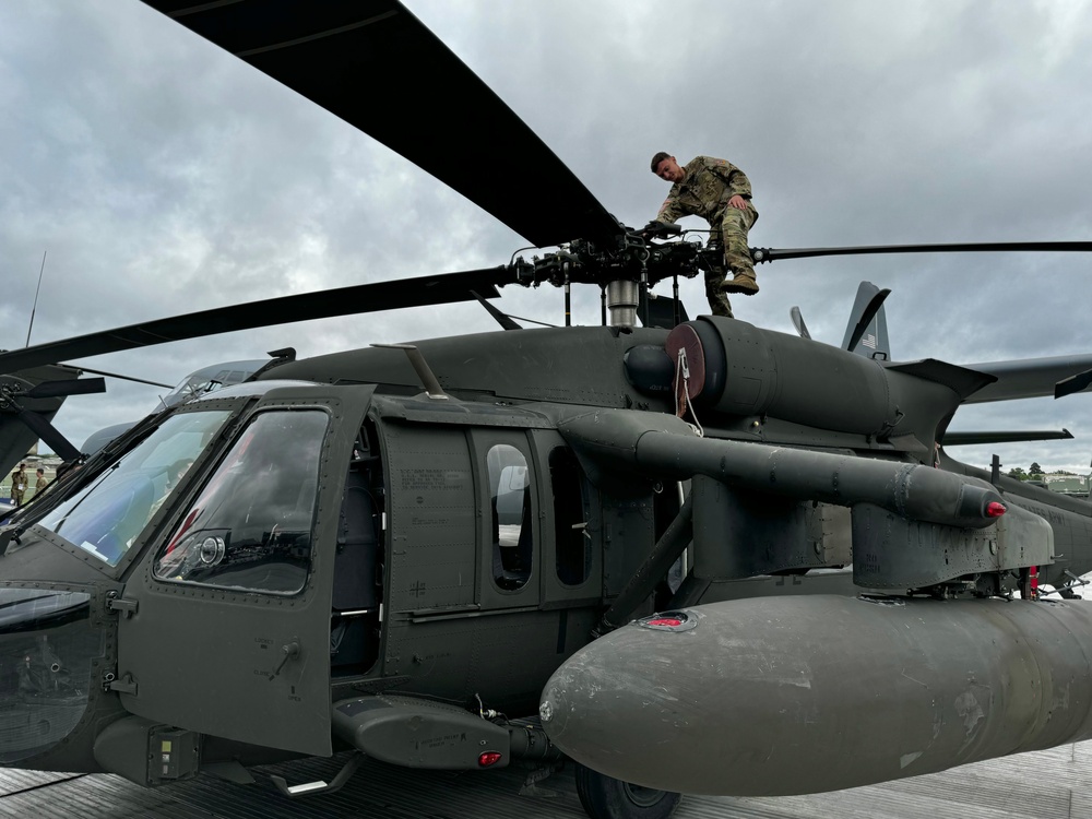 UH-60 Black Hawk Crew Chief Represents the 12th Combat Aviation Brigade at the Farnborough International Airshow