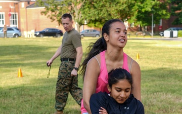 Marine Corps Warfighting Laboratory's Interns participate in the U.S. Marine Corps Combat Fitness Test