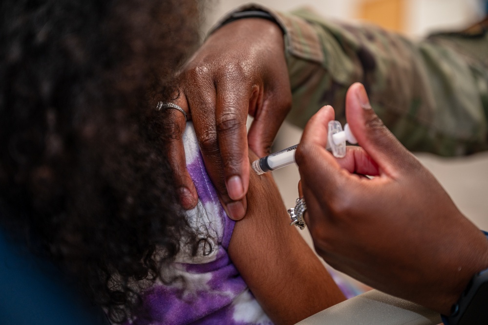 The 325th MDG opens immunizations to families