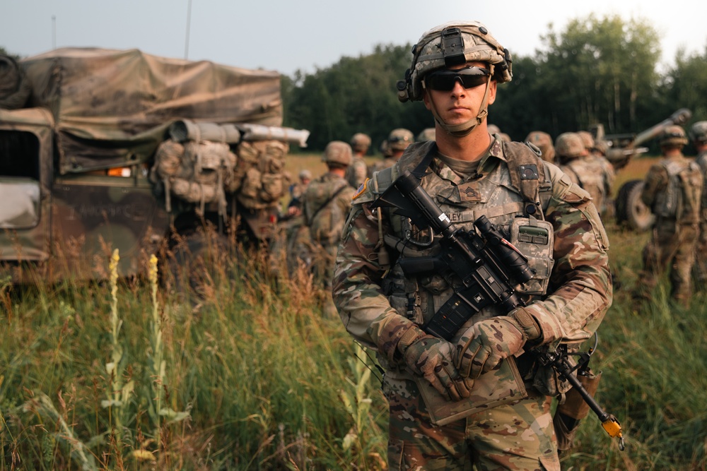 Iowa Army National Guard field artillery platoon sergeant poses for portrait