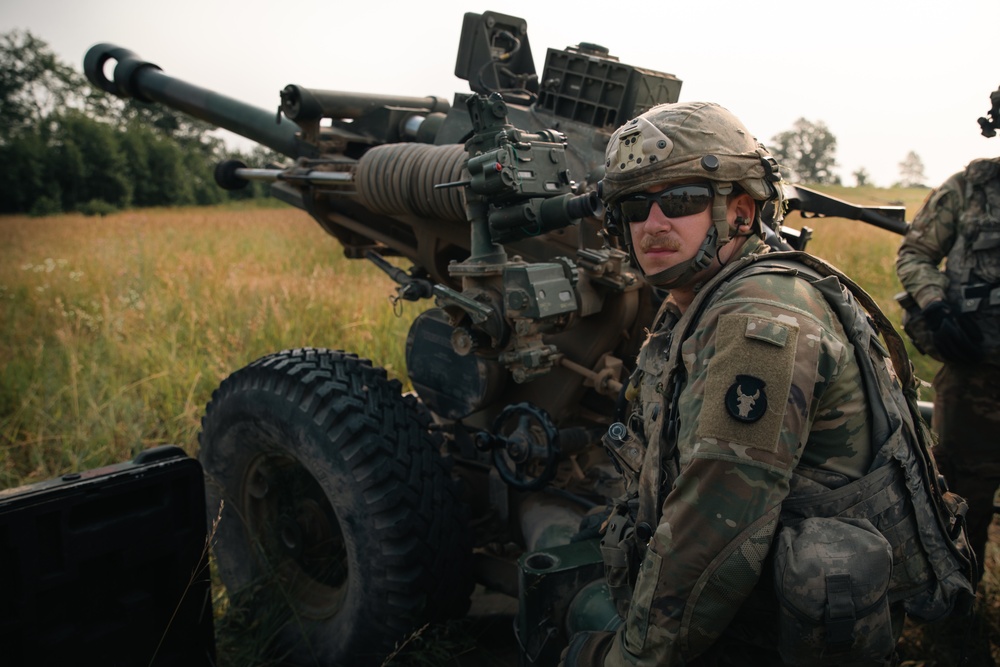 Iowa Army National Guard cannon crewmember awaits Howitzer live-fire