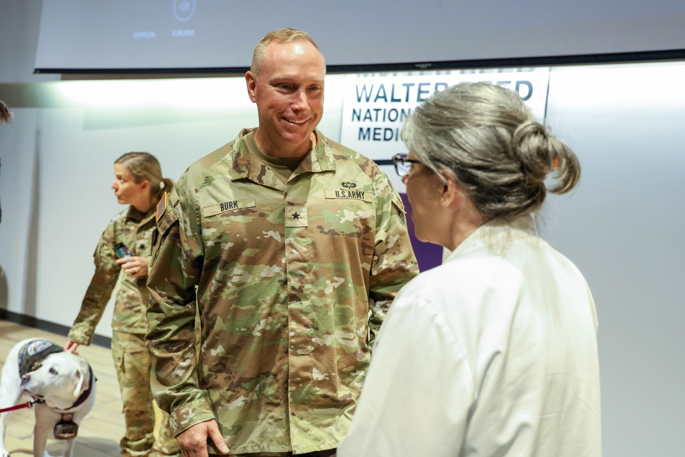 U.S. Army Brig. Gen. James D. Burk, Chief Army Nurse Corps, visits with Army nurses during an official visit to Walter Reed