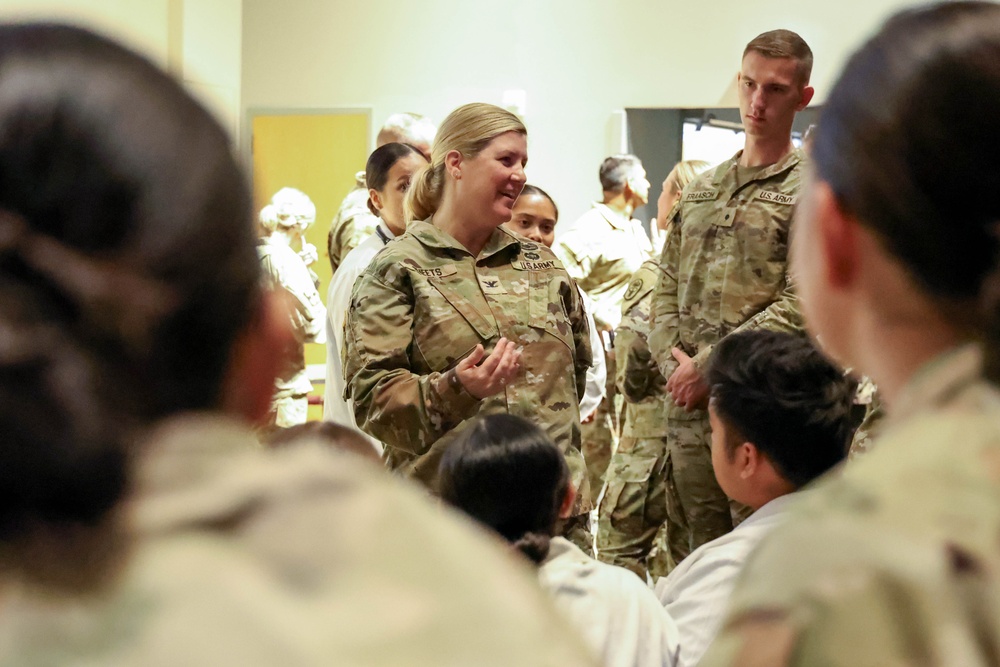 U.S. Army Brig. Gen. James D. Burk, Chief Army Nurse Corps, visits with Army nurses during an official visit to Walter Reed