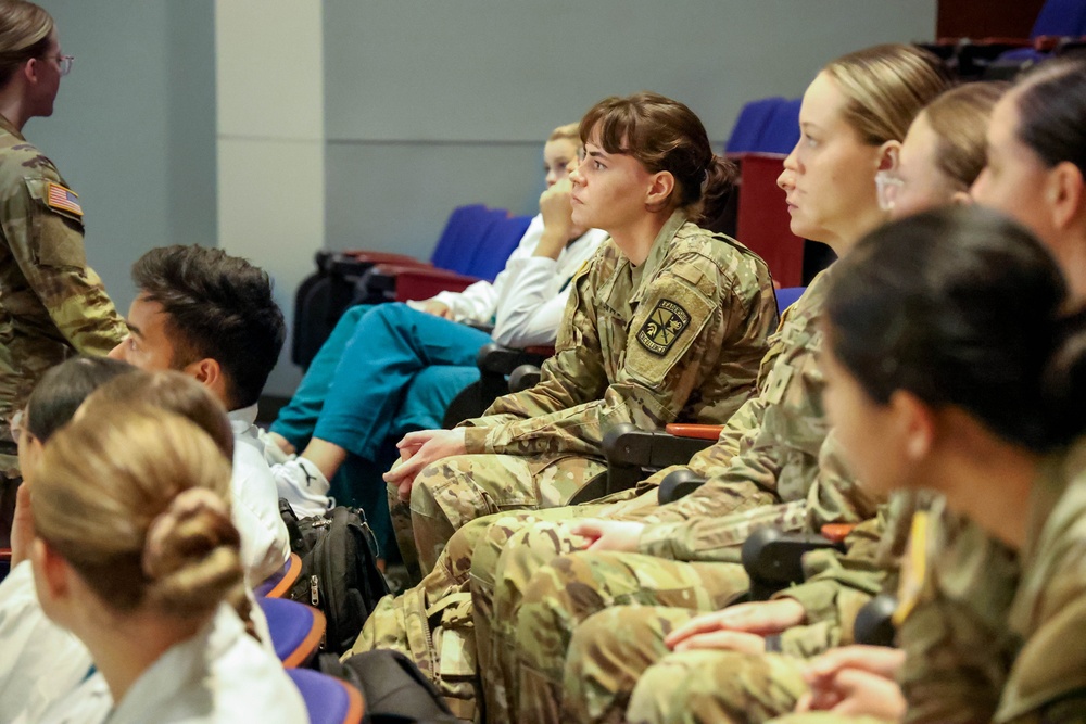 U.S. Army Brig. Gen. James D. Burk, Chief Army Nurse Corps, visits with Army nurses during an official visit to Walter Reed