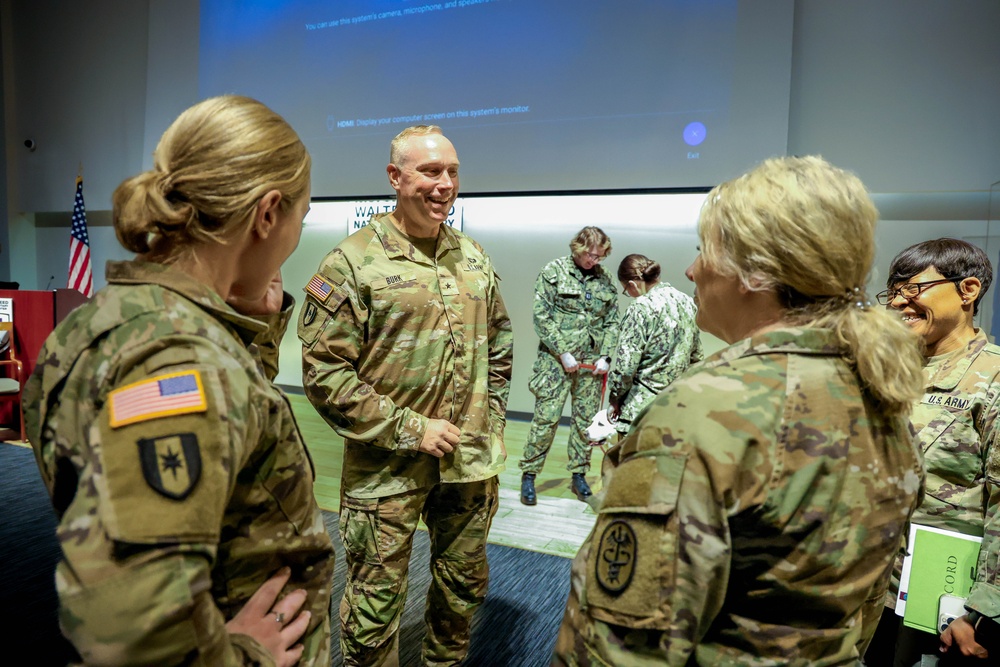 U.S. Army Brig. Gen. James D. Burk, Chief Army Nurse Corps, visits with Army nurses during an official visit to Walter Reed