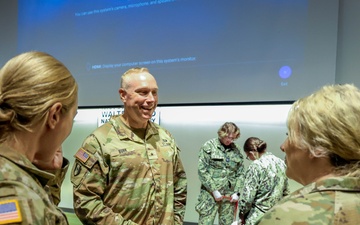 U.S. Army Brig. Gen. James D. Burk, Chief Army Nurse Corps, visits with Army nurses during an official visit to Walter Reed