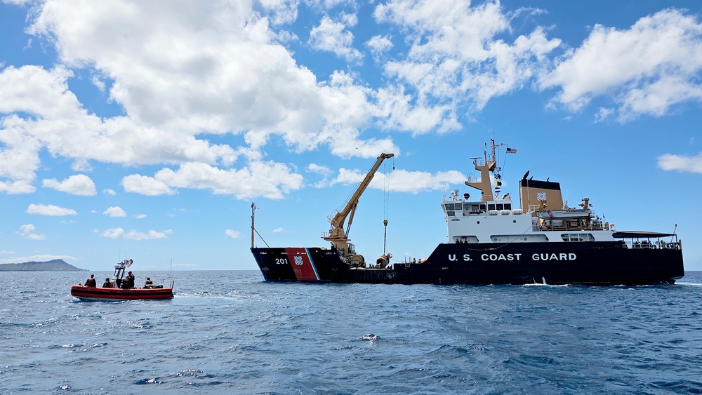 U.S. Coast Guard and Republic of Korea Navy Underwater Construction Team Divers Recover a Buoy During RIMPAC