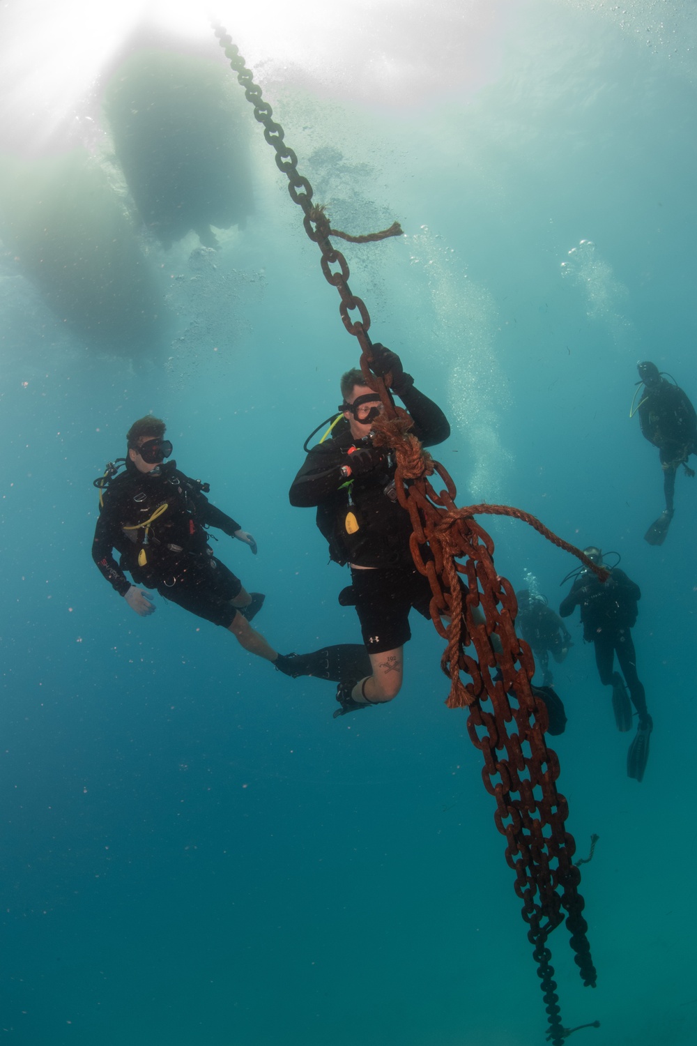 U.S. Coast Guard and Republic of Korea Navy Underwater Construction Team Divers Recover a Sunken Buoy During RIMPAC