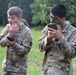 Iowa Soldiers apply face paint ahead of Zodiac boat operation