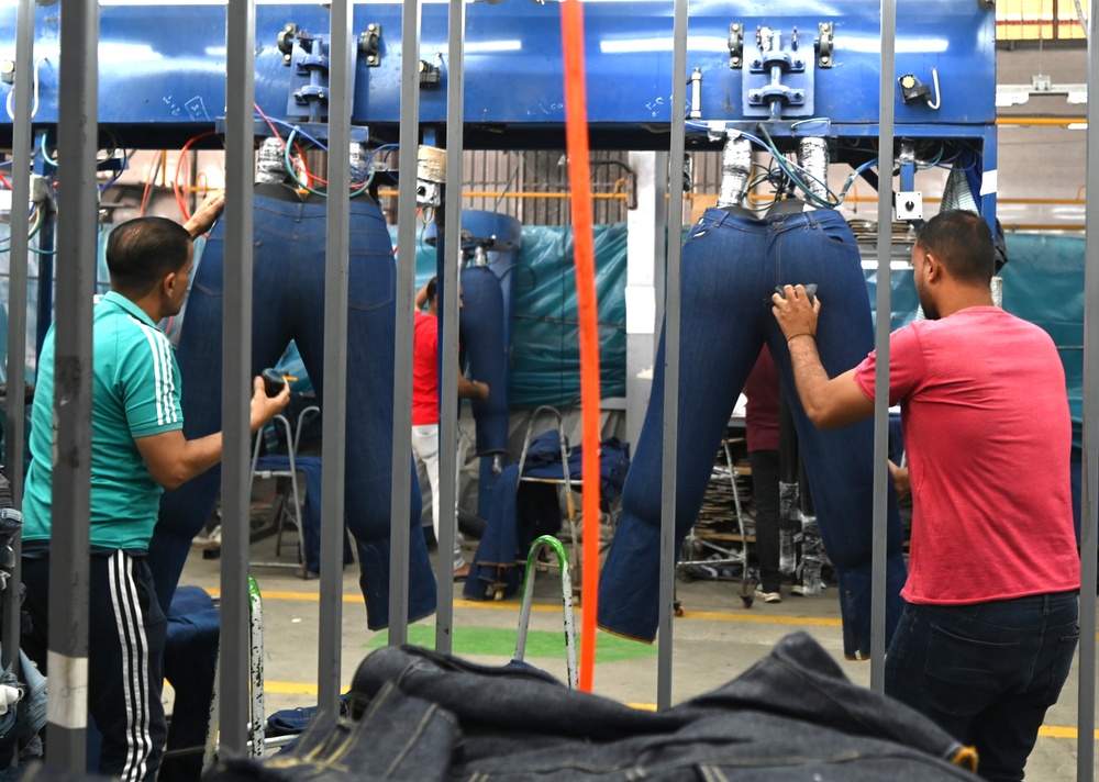 USAID/Egypt Mission Director Sean Jones tours Smart Garment, a denim manufacturer based in Port Said, Egypt