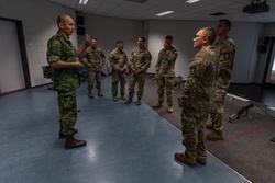 Sgt. Maj. Rik De Jager speaks with memebers of the U.S. CIOR team [Image 2 of 4]