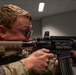 Sgt. Thomas Hunt fires a Colt C7NLD simulation rifle