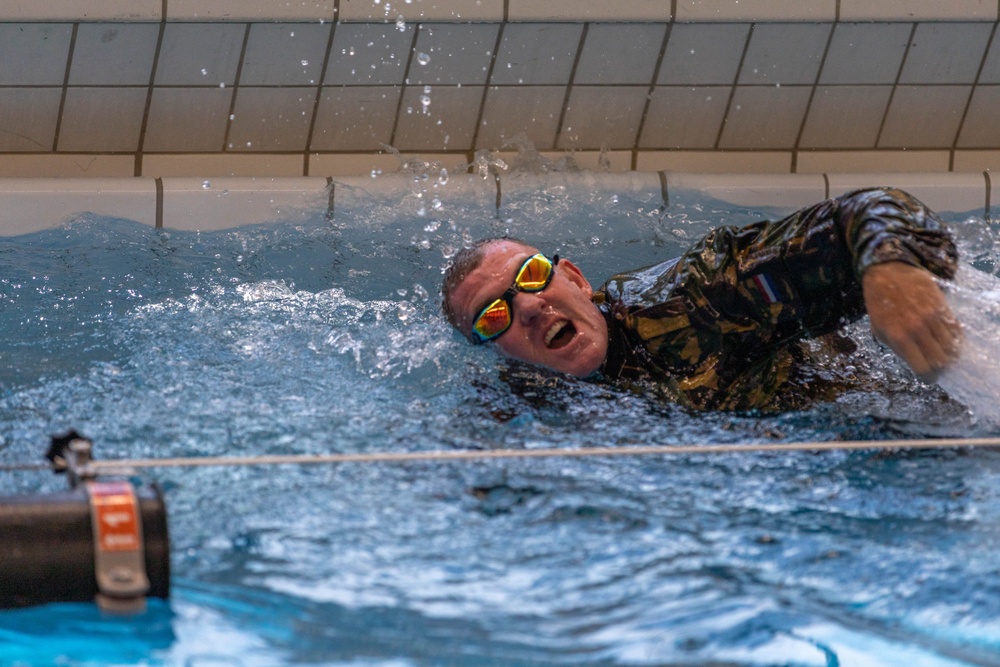 Capt. Zachary Grimes swims