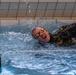 Capt. Zachary Grimes swims