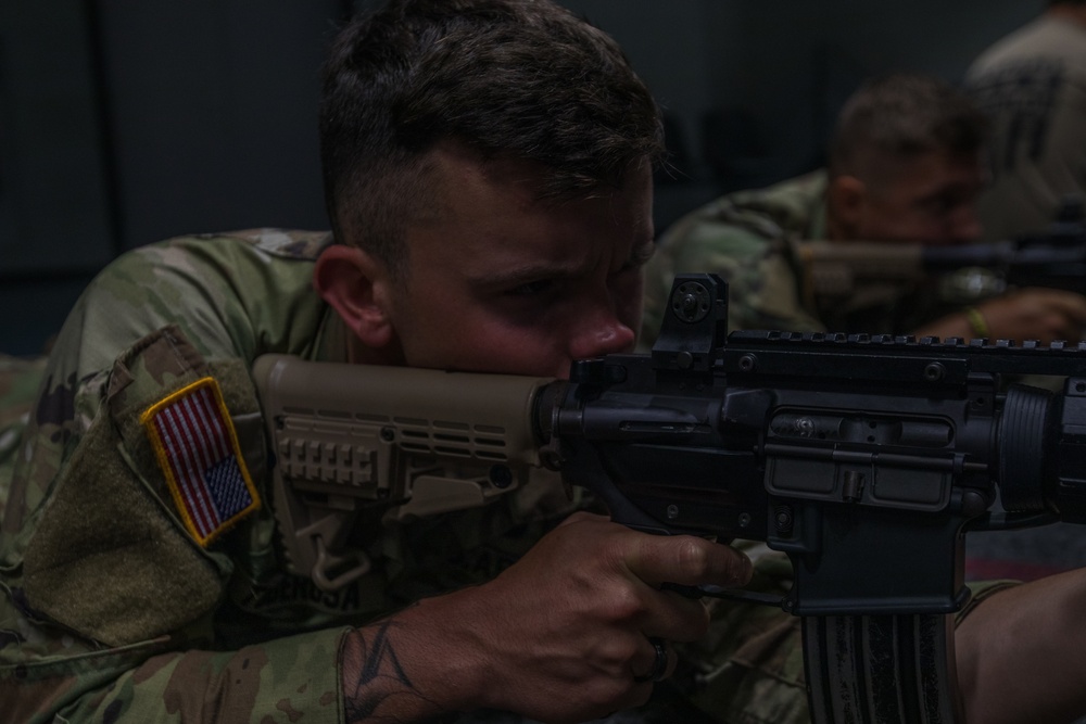 Sergeant Trenton D. Tuberosa conducts marksmanship training
