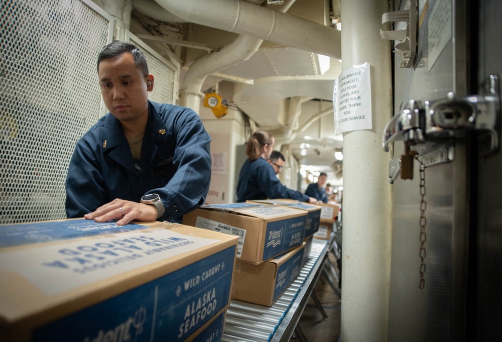 USS America (LHA 6) Conducts Stores Onload