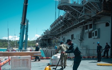 USS America (LHA 6) Conducts Stores Onload
