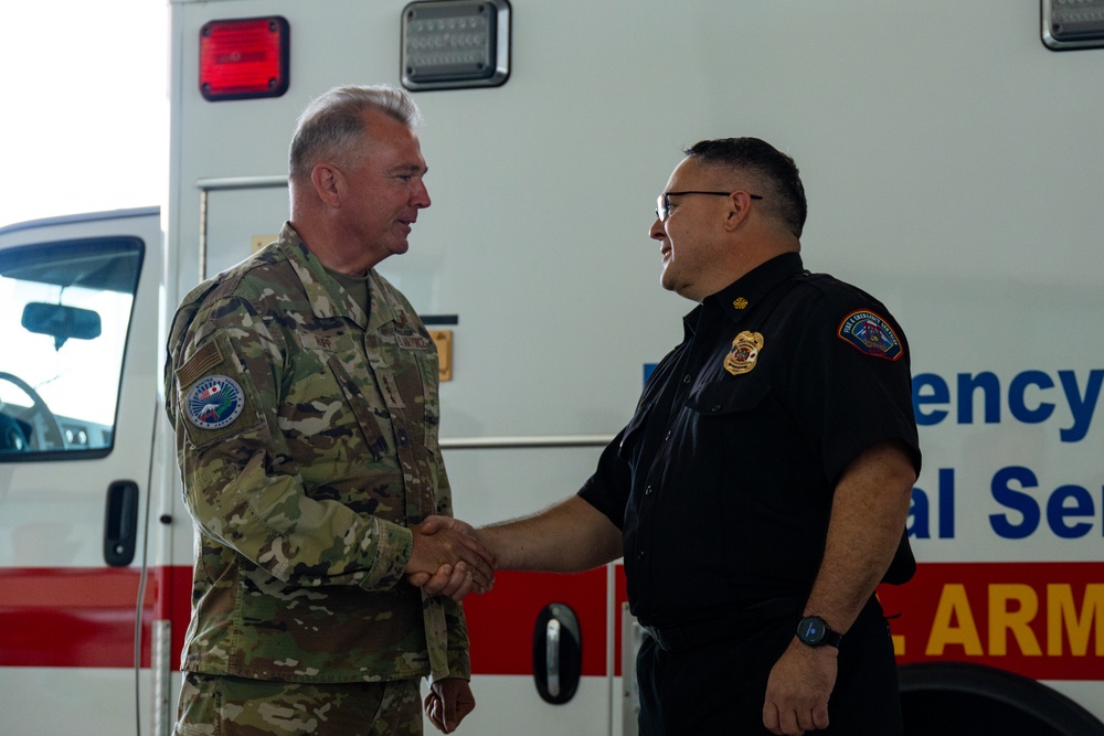 Sailors and Firefighters are recognized for acquisition of three ambulances from Camp Humphreys