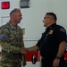 Sailors and Firefighters are recognized for acquisition of three ambulances from Camp Humphreys
