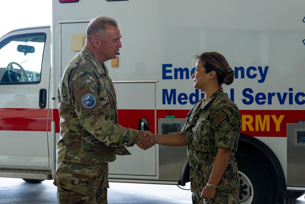 Sailors and Firefighters are recognized for acquisition of three ambulances from Camp Humphreys