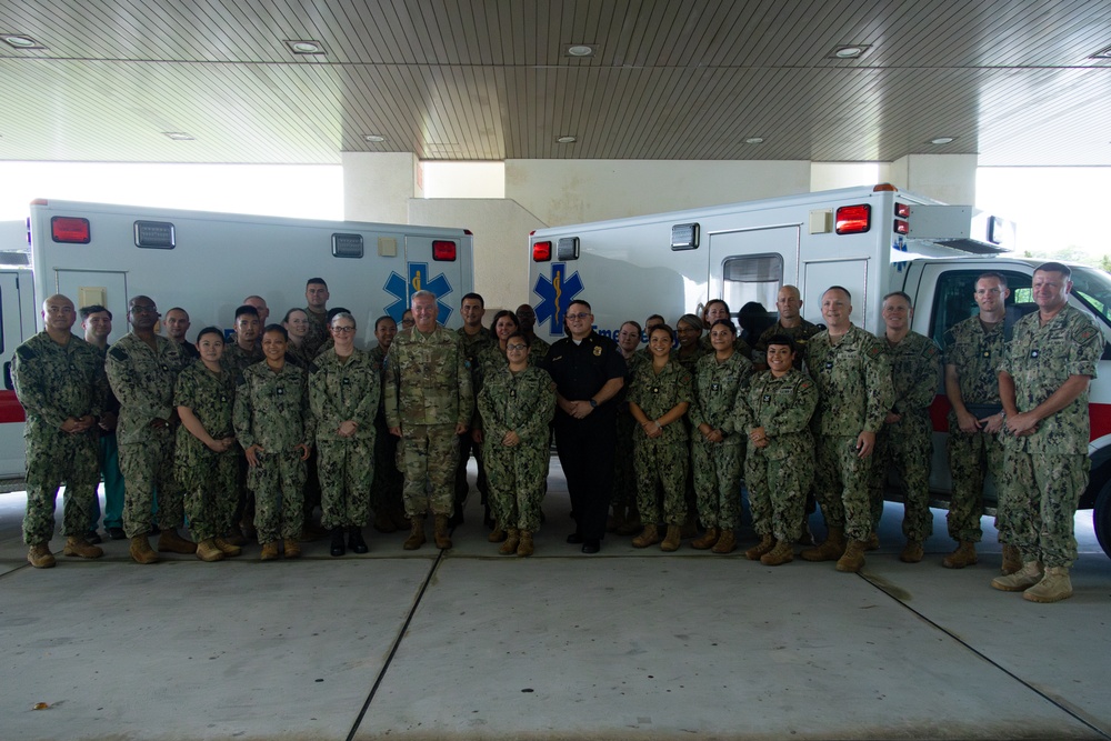 Sailors and Firefighters are recognized for acquisition of three ambulances from Camp Humphreys